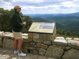 Rich contemplates the many layers of color and contrast visible from the Range View Overlook.