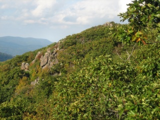 Catching sight of the exposed finger of rock ahead.