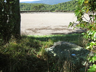 Looking SW from the mark toward the Pinnacle Overlook parking area and the mountains beyond.