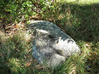 Drill hole where AZ MK 1 was set, with USGS mark 120 MLS in background.