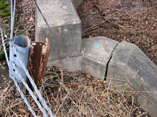 Eyelevel view of the disk on the bridge wingwall.