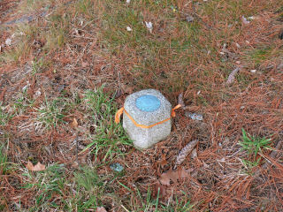 Eyelevel view of disk in monument.