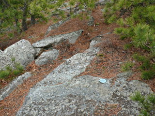 Eyelevel view of RM 2 on rock ledge.