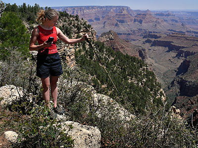 Zhanna points to the coordinates where we expected to find the mark.