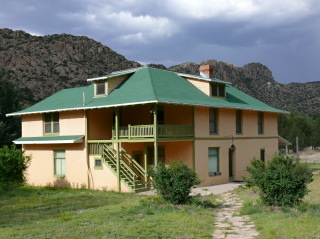 A view of the house, nestled in Bonita Canyon, from the fence surrounding it. What a lovely place to live!