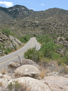 Looking SSW toward Kitt Peak. One of the telescopes can be seen at the top of the mountain.