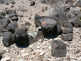 An eyelevel view of the disk on the boulder, once we removed the wood.