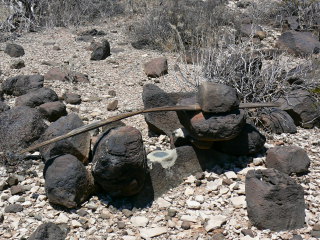 The disk and surrounding boulders, as it appeared when we arrived. Note the piece of wood across the top.