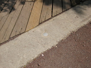 Eyelevel view of the disk in the bridge abutment.