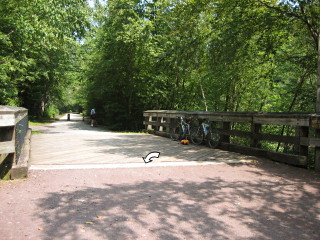 Looking N along the bridge, mark indicated.