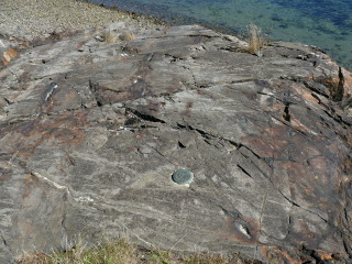 Eyelevel view of the disk in the rock ledge.