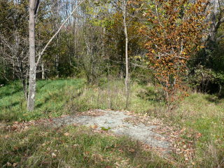 The boulder as viewed when approaching from the general direction of the station.