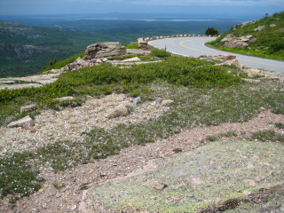 Looking SW from the ledge, with the mark in the foreground. Even on cloudy days, the views are spectacular!