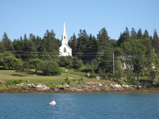 On our return trip, the spire shows up beautifully under a bright blue sky.