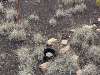 Eyelevel view of the mark on rod, near the base of the witness post.