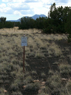 Looking approximately S toward one of the volcanic cinder cones (possibly Sunset Crater).