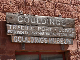 Mark (indicated) on the porch of the trading post (now Goulding’s Museum)