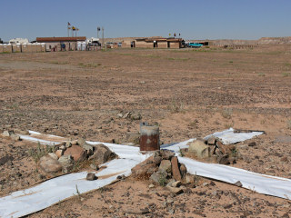 View W toward the Four Corners Monument (AD9256) and some of the Navajo food and merchandise stands surrounding it.