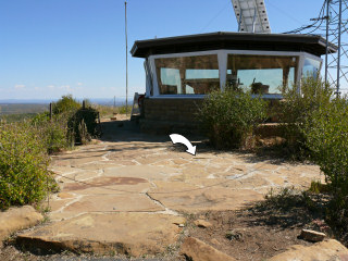 View of the mark (indicated) in proximity to the fire lookout station.