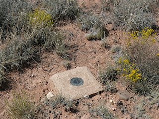 Eyelevel view of the reference mark in the concrete monument.