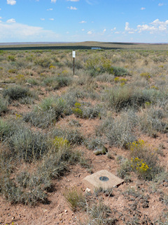 Looking approximately W toward the witness post and the station monument.