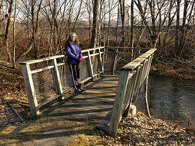 Zhanna has found a nice perch over the river.