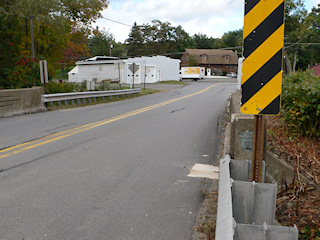 Looking NW along Wimmers Road toward Rt. 348 (Mt. Cobb Road). Disk is on the near wingwall, just below the PDH keystone plaque.