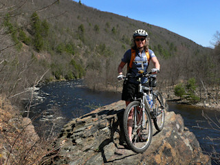 This rocky ledge overlooking the river is a good place to stop for a snack!