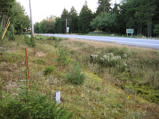 Looking SSW across Route 102 toward Welcome to Southwest Harbor sign.