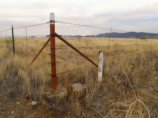 Corner of the fence and ROW post