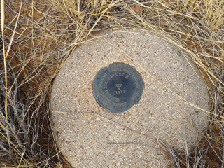 View of the disk and the round concrete monument.