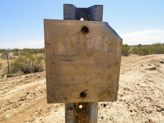 Witness sign; reads SURVEY [something] – DO NOT DISTURB