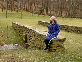 Zhanna sits on the bridge. Notice the expert stonework!