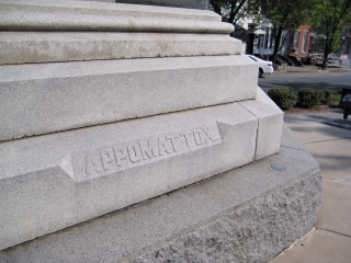 Eyelevel view of the disk set into the base of the monument.