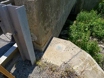 Eyelevel view of the disk on the bridge wingwall