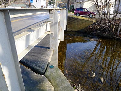 Eyelevel view of the disk on the bridge wingwall