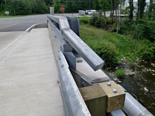 Eyelevel view of the disk on the NW sidewall of the bridge.