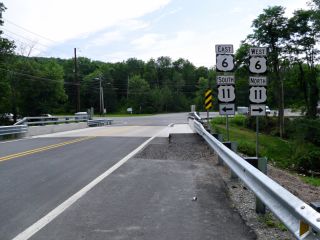 Looking WSW, toward the intersection of Routes 438 with Routes 6 & 11 in La Plume.