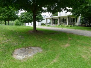 Eyelevel view of the mark on outcrop, looking NW toward residence.