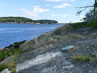 The disk is set into this sloped bluff.