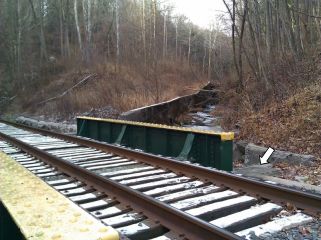 Disk is on the NE wingwall of the bridge.