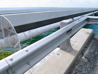 Eyelevel view of the disk on the bridge abutment.