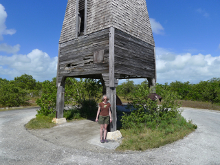 Zhanna stands near the benchmark.