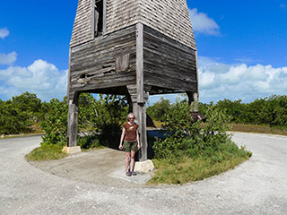 Zhanna stands next to the mark, at the south leg of the tower