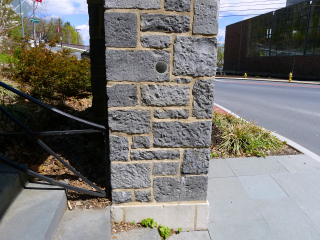 The disk is set in the west face of the east stone pillar.