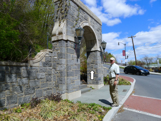 Dad approaches the gate from the south.