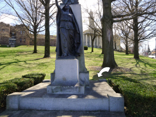 View from the front of the monument, with the courthouse in the background.