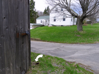 Looking NW from the road toward the nearby house.