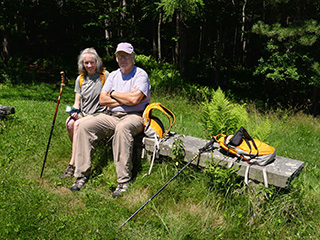 Zhanna and Dad take a break by the pond