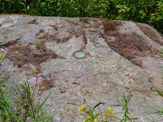 Eyelevel view of the disk in the boulder.